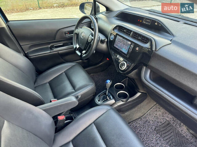 Синий Тойота Aqua, объемом двигателя 1.5 л и пробегом 76 тыс. км за 12800 $, фото 14 на Automoto.ua