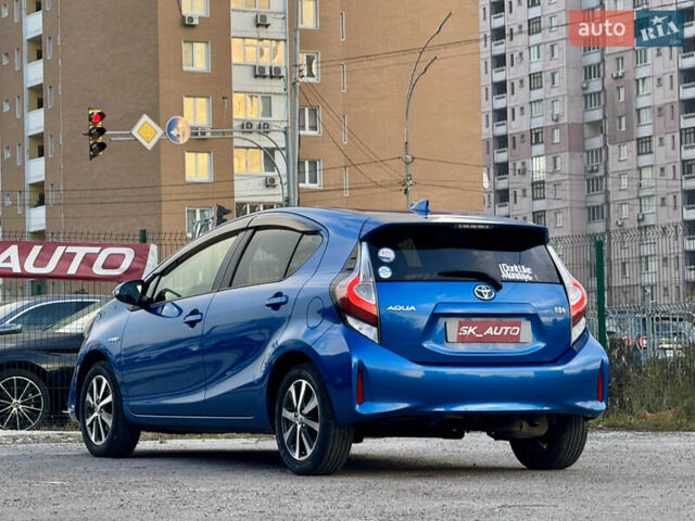 Синий Тойота Aqua, объемом двигателя 1.5 л и пробегом 76 тыс. км за 12800 $, фото 7 на Automoto.ua