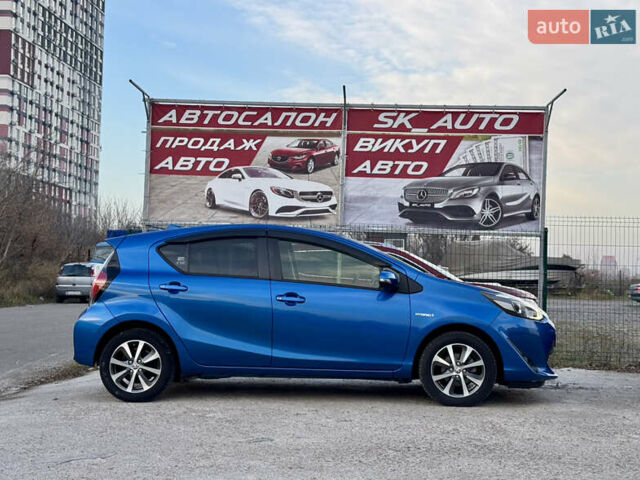 Синий Тойота Aqua, объемом двигателя 1.5 л и пробегом 76 тыс. км за 12800 $, фото 4 на Automoto.ua