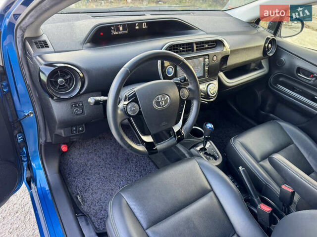 Синий Тойота Aqua, объемом двигателя 1.5 л и пробегом 76 тыс. км за 12800 $, фото 26 на Automoto.ua