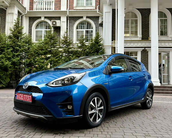 Синий Тойота Aqua, объемом двигателя 1.5 л и пробегом 52 тыс. км за 13500 $, фото 2 на Automoto.ua