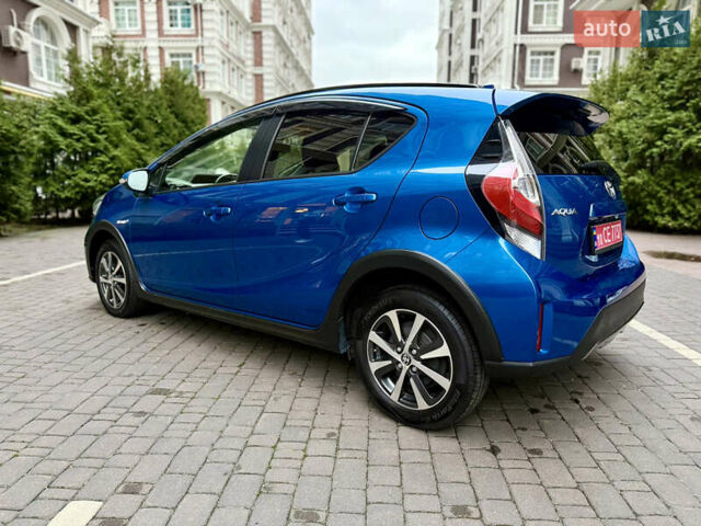 Синий Тойота Aqua, объемом двигателя 1.5 л и пробегом 52 тыс. км за 13500 $, фото 4 на Automoto.ua