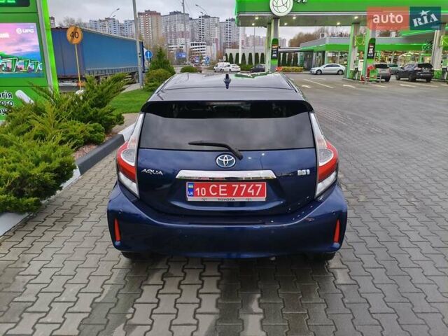 Синий Тойота Aqua, объемом двигателя 1.5 л и пробегом 77 тыс. км за 12500 $, фото 5 на Automoto.ua