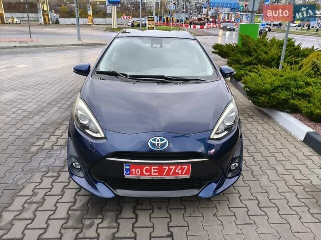 Синий Тойота Aqua, объемом двигателя 1.5 л и пробегом 77 тыс. км за 12500 $, фото 12 на Automoto.ua