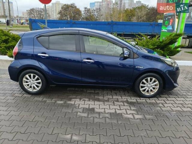 Синий Тойота Aqua, объемом двигателя 1.5 л и пробегом 77 тыс. км за 12500 $, фото 2 на Automoto.ua