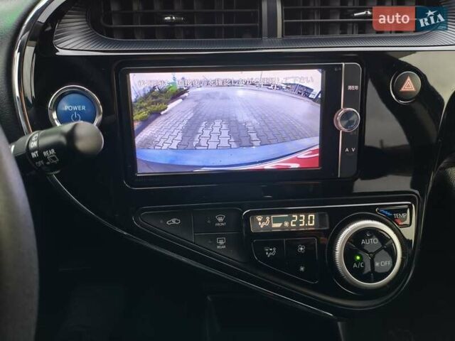 Синий Тойота Aqua, объемом двигателя 1.5 л и пробегом 77 тыс. км за 12500 $, фото 28 на Automoto.ua