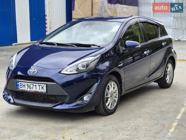 Синий Тойота Aqua, объемом двигателя 1.5 л и пробегом 76 тыс. км за 12799 $, фото 25 на Automoto.ua