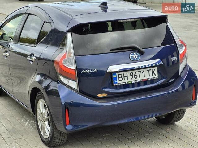 Синий Тойота Aqua, объемом двигателя 1.5 л и пробегом 76 тыс. км за 12799 $, фото 20 на Automoto.ua