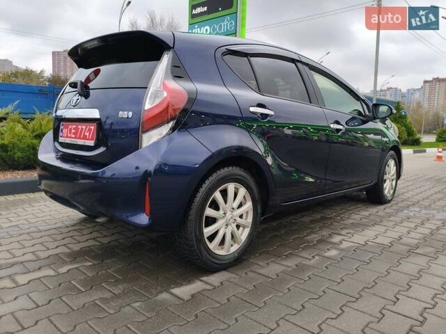 Синий Тойота Aqua, объемом двигателя 1.5 л и пробегом 77 тыс. км за 12500 $, фото 4 на Automoto.ua