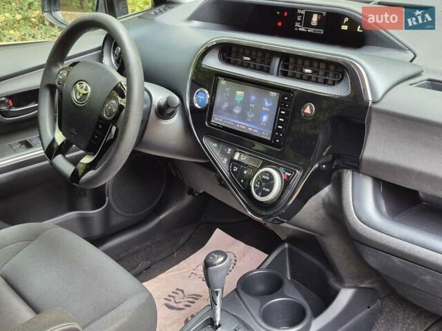 Синий Тойота Aqua, объемом двигателя 1.5 л и пробегом 76 тыс. км за 12799 $, фото 33 на Automoto.ua