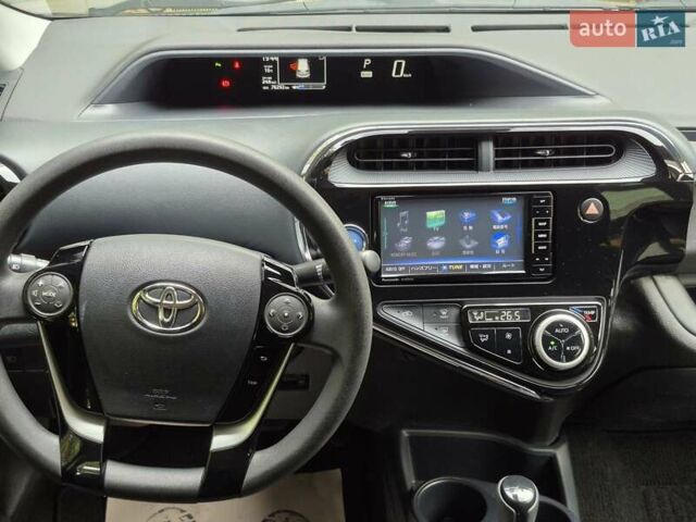 Синий Тойота Aqua, объемом двигателя 1.5 л и пробегом 76 тыс. км за 12799 $, фото 30 на Automoto.ua