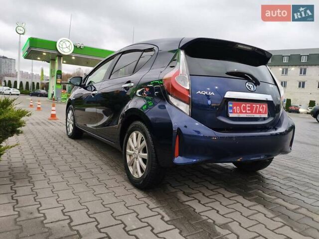 Синий Тойота Aqua, объемом двигателя 1.5 л и пробегом 77 тыс. км за 12500 $, фото 8 на Automoto.ua