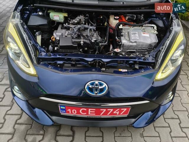 Синий Тойота Aqua, объемом двигателя 1.5 л и пробегом 77 тыс. км за 12500 $, фото 34 на Automoto.ua