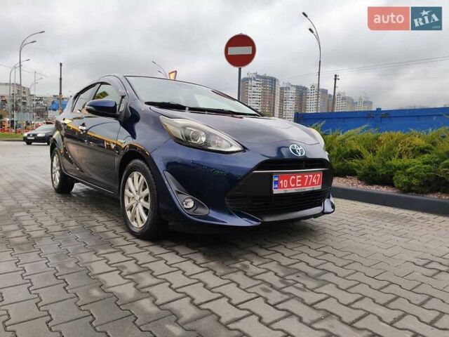 Синий Тойота Aqua, объемом двигателя 1.5 л и пробегом 77 тыс. км за 12500 $, фото 1 на Automoto.ua