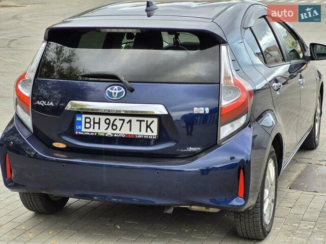 Синий Тойота Aqua, объемом двигателя 1.5 л и пробегом 76 тыс. км за 12799 $, фото 21 на Automoto.ua