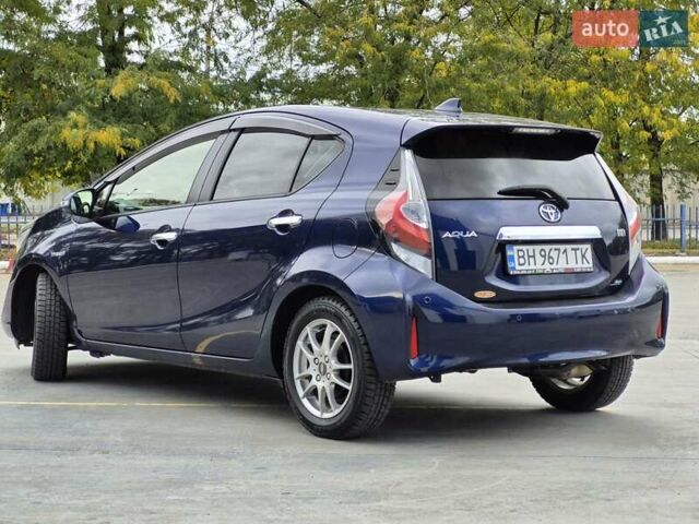 Синий Тойота Aqua, объемом двигателя 1.5 л и пробегом 76 тыс. км за 12799 $, фото 10 на Automoto.ua