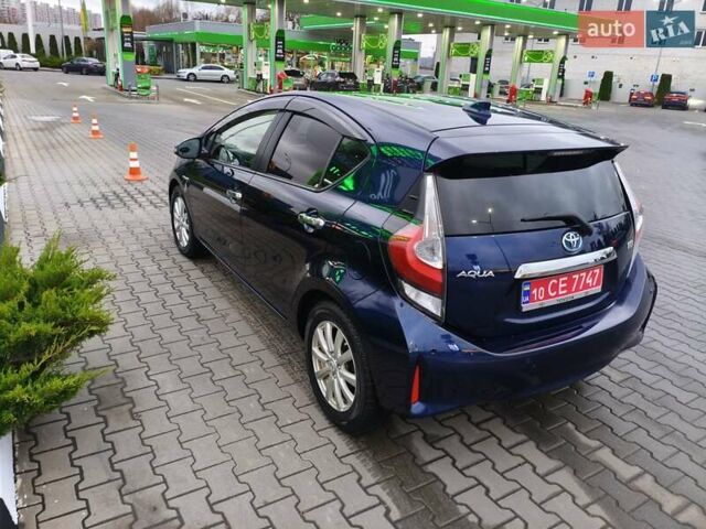 Синий Тойота Aqua, объемом двигателя 1.5 л и пробегом 77 тыс. км за 12500 $, фото 7 на Automoto.ua