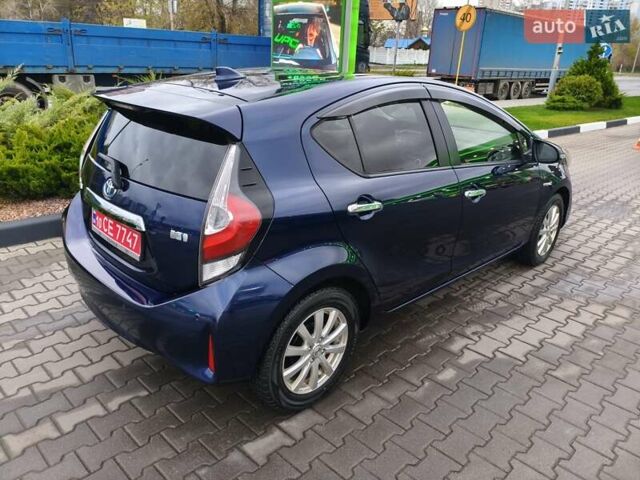 Синий Тойота Aqua, объемом двигателя 1.5 л и пробегом 77 тыс. км за 12500 $, фото 3 на Automoto.ua