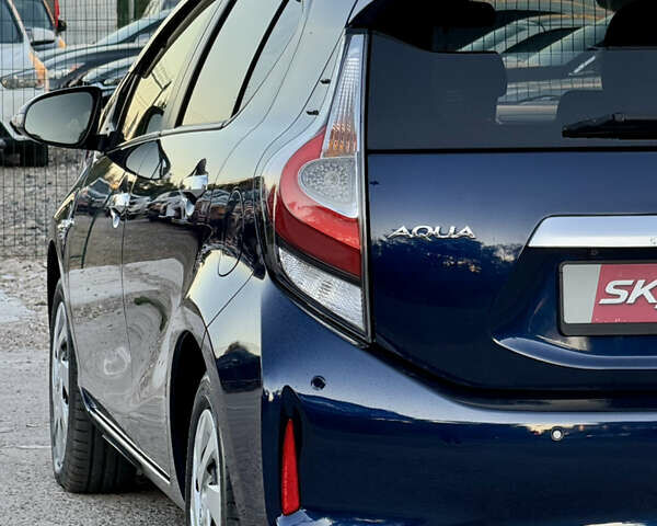 Синий Тойота Aqua, объемом двигателя 1.5 л и пробегом 81 тыс. км за 12000 $, фото 88 на Automoto.ua