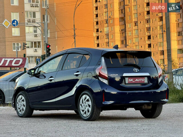 Синий Тойота Aqua, объемом двигателя 1.5 л и пробегом 81 тыс. км за 12000 $, фото 85 на Automoto.ua