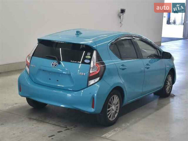 Синий Тойота Aqua, объемом двигателя 1.5 л и пробегом 98 тыс. км за 13000 $, фото 2 на Automoto.ua