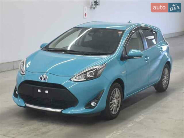 Синий Тойота Aqua, объемом двигателя 1.5 л и пробегом 98 тыс. км за 13000 $, фото 1 на Automoto.ua