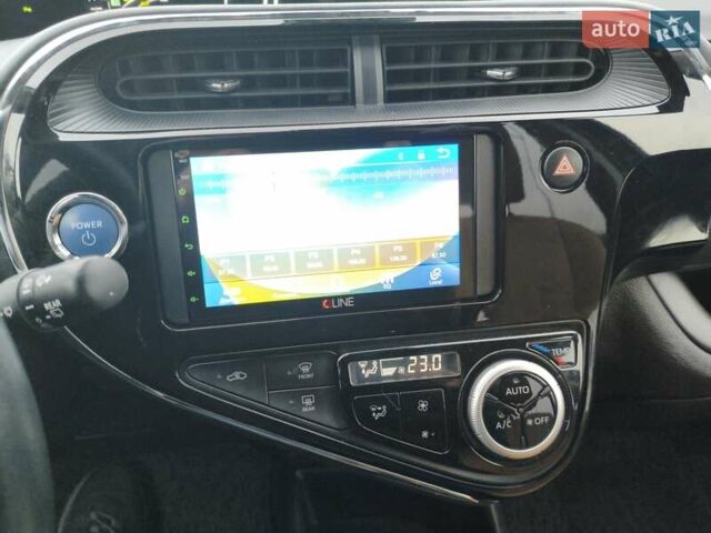 Синий Тойота Aqua, объемом двигателя 1.5 л и пробегом 53 тыс. км за 13800 $, фото 28 на Automoto.ua