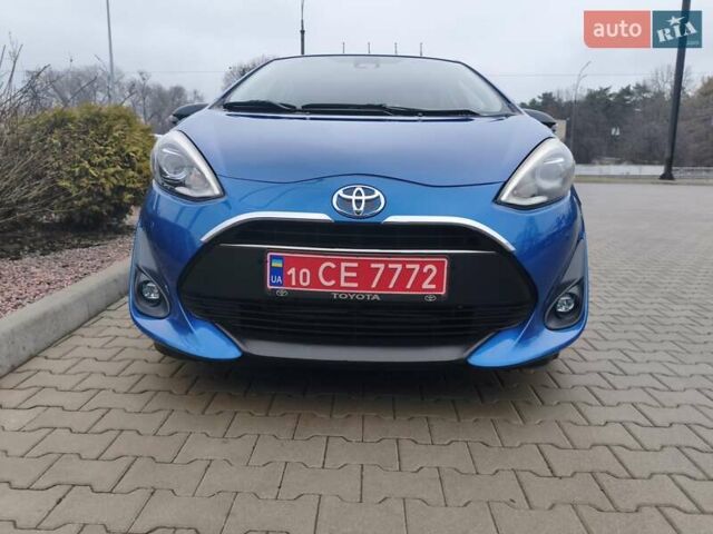 Синий Тойота Aqua, объемом двигателя 1.5 л и пробегом 53 тыс. км за 13800 $, фото 3 на Automoto.ua