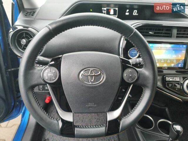 Синий Тойота Aqua, объемом двигателя 1.5 л и пробегом 53 тыс. км за 13800 $, фото 25 на Automoto.ua