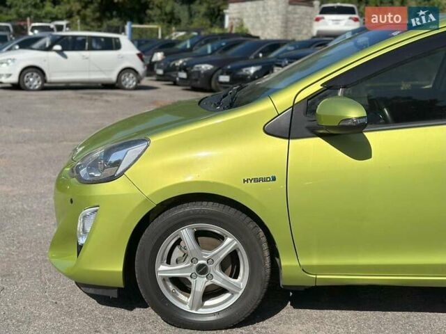 Зеленый Тойота Aqua, объемом двигателя 1.5 л и пробегом 112 тыс. км за 10940 $, фото 6 на Automoto.ua