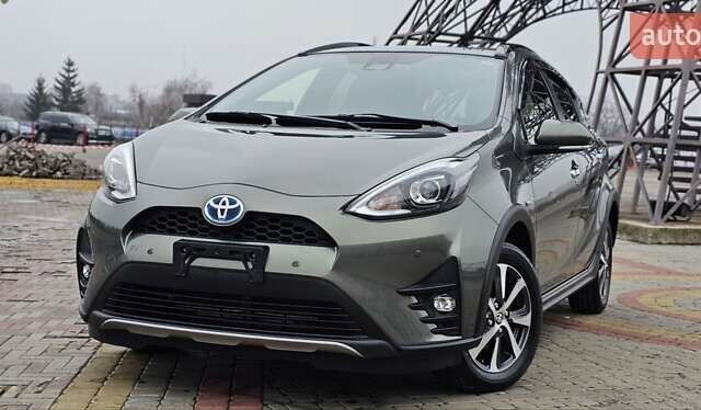 Зелений Тойота Aqua, об'ємом двигуна 1.5 л та пробігом 82 тис. км за 15900 $, фото 4 на Automoto.ua