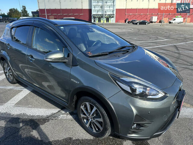 Зеленый Тойота Aqua, объемом двигателя 1.5 л и пробегом 93 тыс. км за 15500 $, фото 5 на Automoto.ua