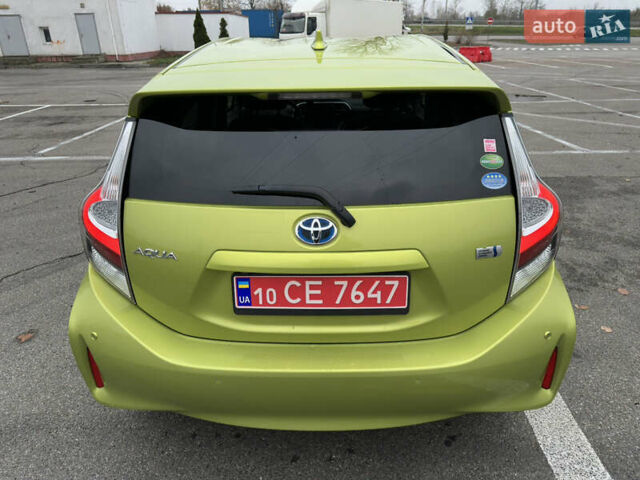 Зелений Тойота Aqua, об'ємом двигуна 1.5 л та пробігом 108 тис. км за 12900 $, фото 26 на Automoto.ua
