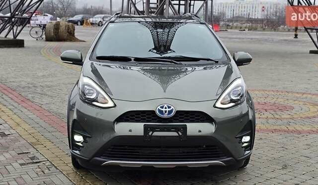 Зелений Тойота Aqua, об'ємом двигуна 1.5 л та пробігом 82 тис. км за 15900 $, фото 35 на Automoto.ua