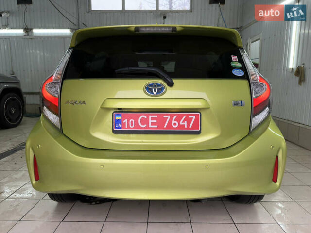 Зелений Тойота Aqua, об'ємом двигуна 1.5 л та пробігом 108 тис. км за 12900 $, фото 4 на Automoto.ua