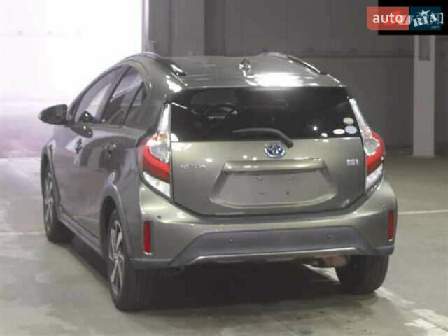 Зелений Тойота Aqua, об'ємом двигуна 1.5 л та пробігом 96 тис. км за 13500 $, фото 45 на Automoto.ua