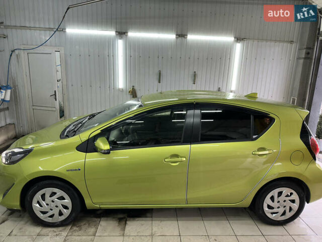 Зелений Тойота Aqua, об'ємом двигуна 1.5 л та пробігом 108 тис. км за 12900 $, фото 2 на Automoto.ua