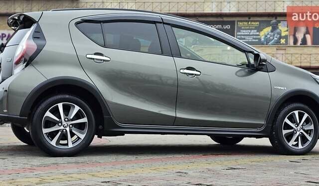 Зелений Тойота Aqua, об'ємом двигуна 1.5 л та пробігом 82 тис. км за 15900 $, фото 25 на Automoto.ua