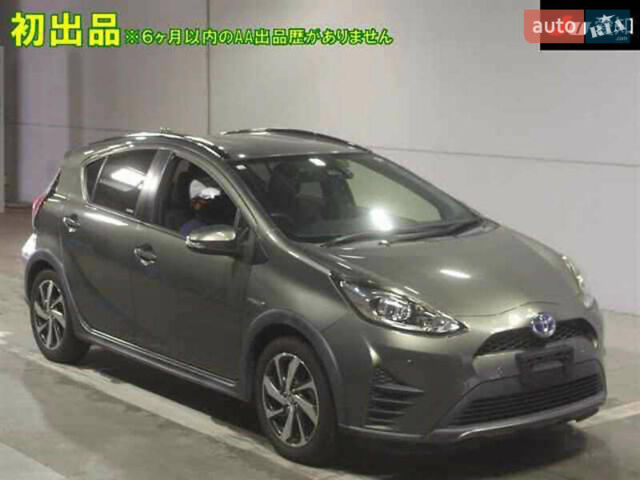 Зелений Тойота Aqua, об'ємом двигуна 1.5 л та пробігом 96 тис. км за 13500 $, фото 46 на Automoto.ua