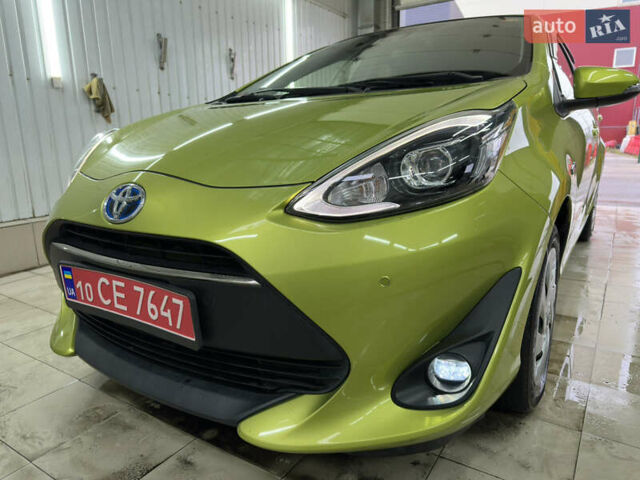 Зелений Тойота Aqua, об'ємом двигуна 1.5 л та пробігом 108 тис. км за 12900 $, фото 1 на Automoto.ua