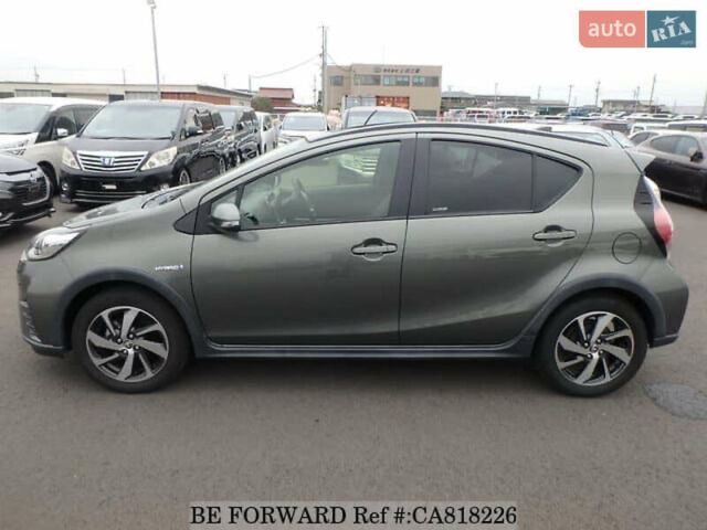 Зелений Тойота Aqua, об'ємом двигуна 1.5 л та пробігом 96 тис. км за 13500 $, фото 6 на Automoto.ua