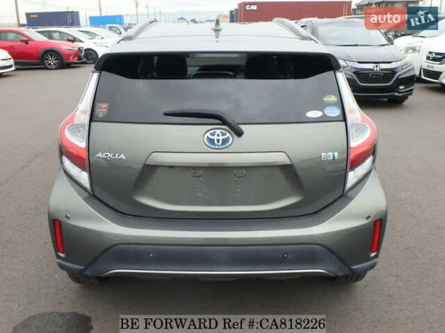 Зелений Тойота Aqua, об'ємом двигуна 1.5 л та пробігом 96 тис. км за 13500 $, фото 3 на Automoto.ua