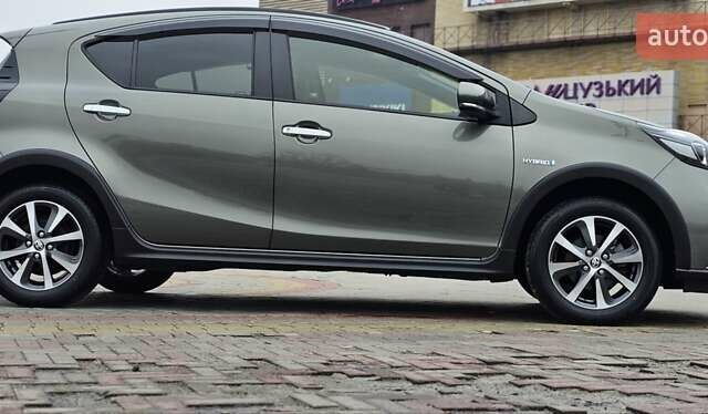 Зелений Тойота Aqua, об'ємом двигуна 1.5 л та пробігом 82 тис. км за 15900 $, фото 28 на Automoto.ua