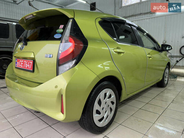 Зелений Тойота Aqua, об'ємом двигуна 1.5 л та пробігом 108 тис. км за 12900 $, фото 5 на Automoto.ua