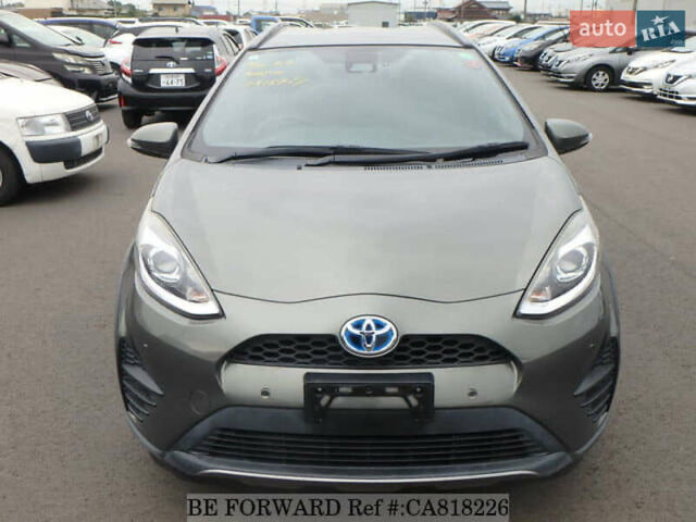 Зелений Тойота Aqua, об'ємом двигуна 1.5 л та пробігом 96 тис. км за 13500 $, фото 4 на Automoto.ua