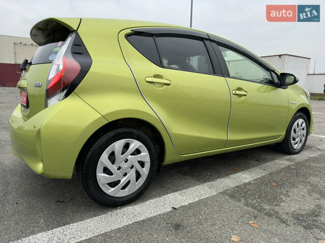 Зелений Тойота Aqua, об'ємом двигуна 1.5 л та пробігом 108 тис. км за 12900 $, фото 25 на Automoto.ua