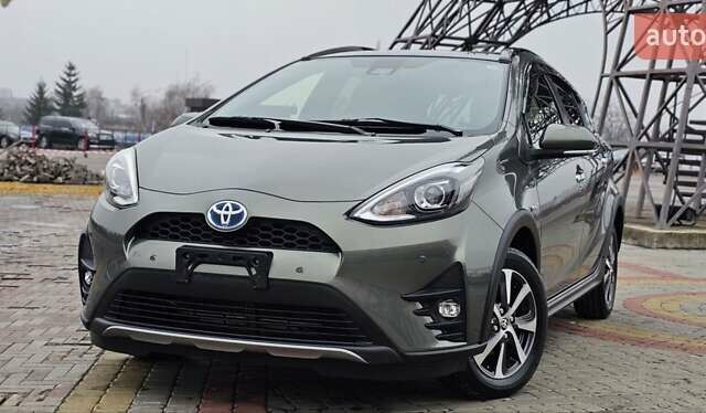 Зелений Тойота Aqua, об'ємом двигуна 1.5 л та пробігом 82 тис. км за 15900 $, фото 5 на Automoto.ua