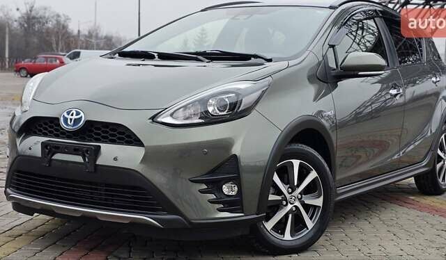 Зелений Тойота Aqua, об'ємом двигуна 1.5 л та пробігом 82 тис. км за 15900 $, фото 1 на Automoto.ua