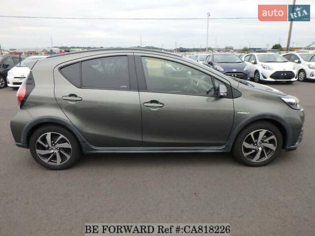 Зелений Тойота Aqua, об'ємом двигуна 1.5 л та пробігом 96 тис. км за 13500 $, фото 2 на Automoto.ua