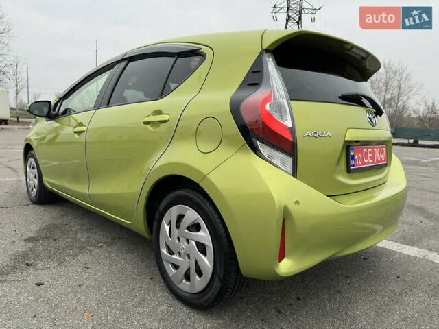 Зелений Тойота Aqua, об'ємом двигуна 1.5 л та пробігом 108 тис. км за 12900 $, фото 29 на Automoto.ua